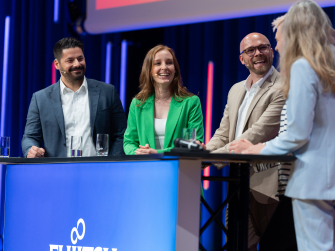 Thomas Müller, Patricia Biernacki und Dr. Fabian Mehring auf der Bühne